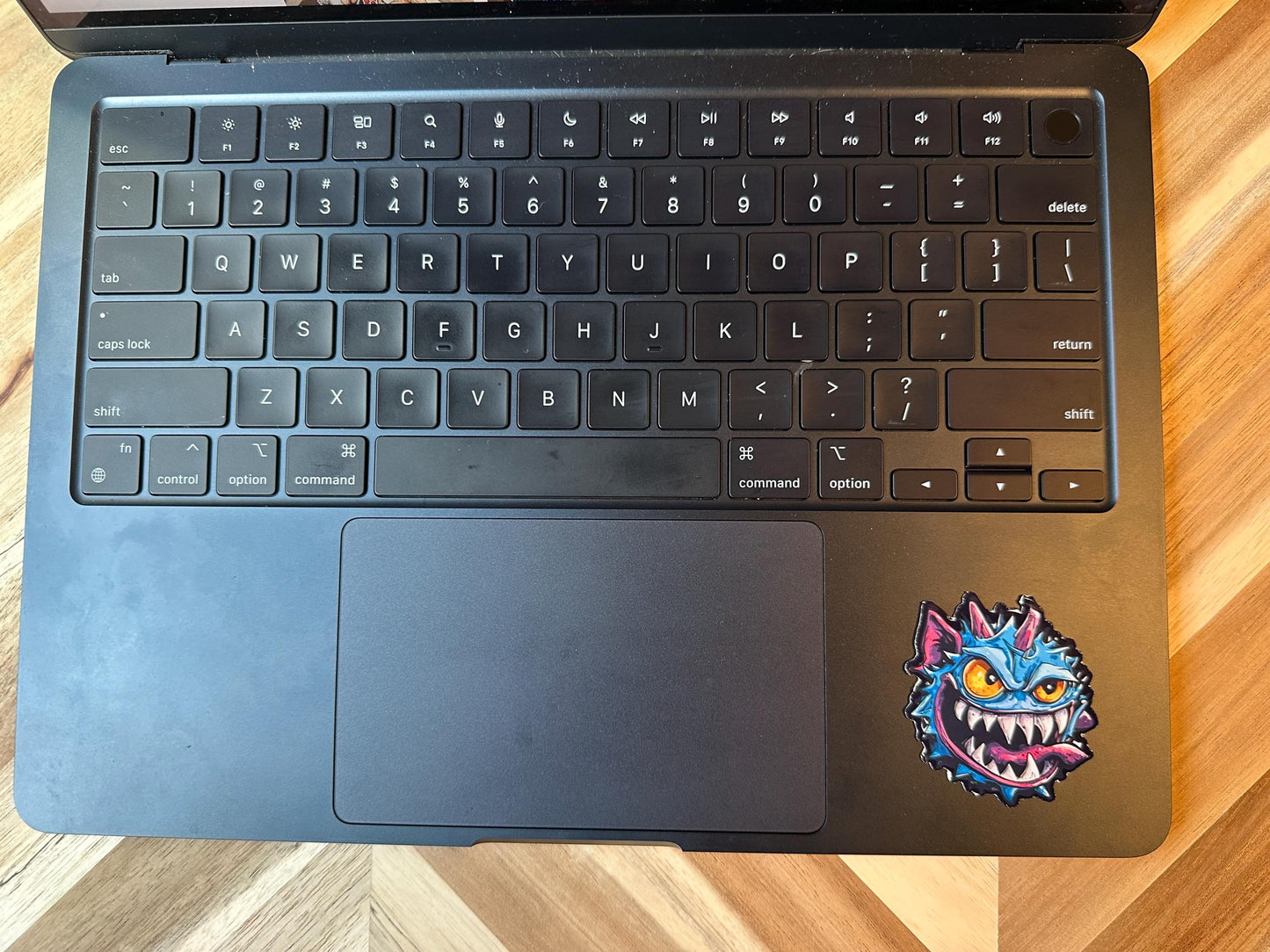 Blue Spike Monster Vinyl Sticker: Mischievous Gaming Character Art