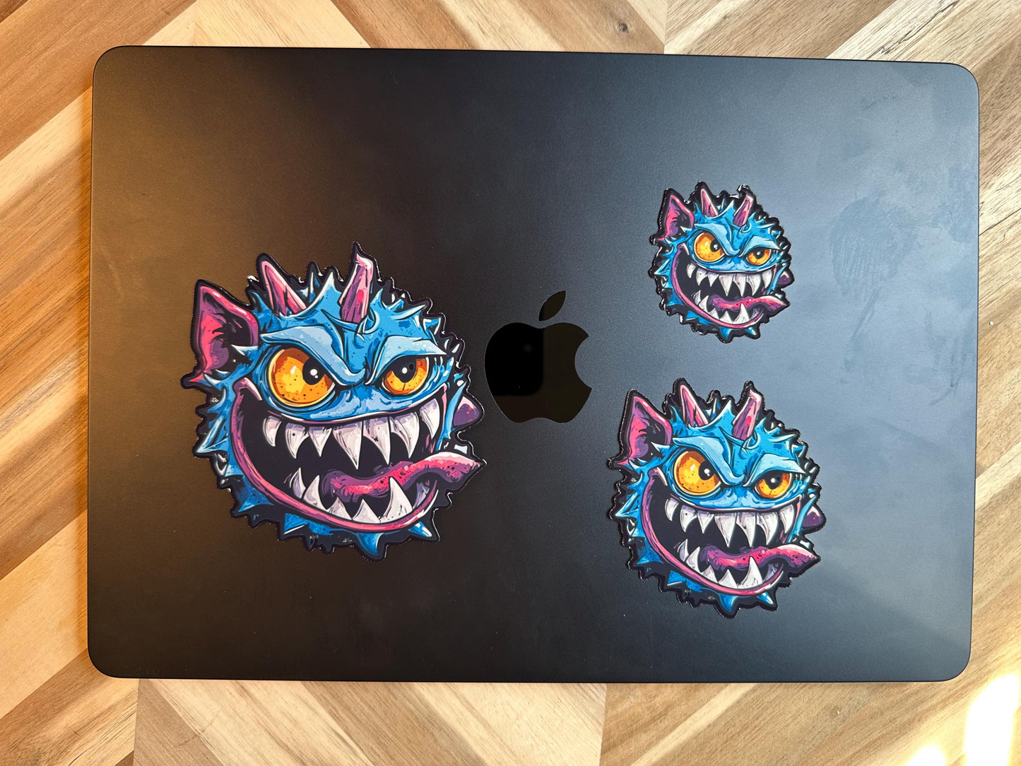 Blue Spike Monster Vinyl Sticker: Mischievous Gaming Character Art