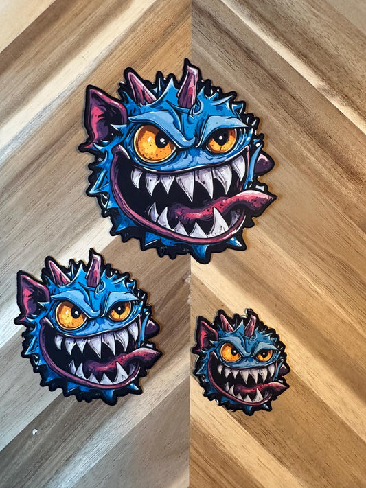 Blue Spike Monster Vinyl Sticker: Mischievous Gaming Character Art