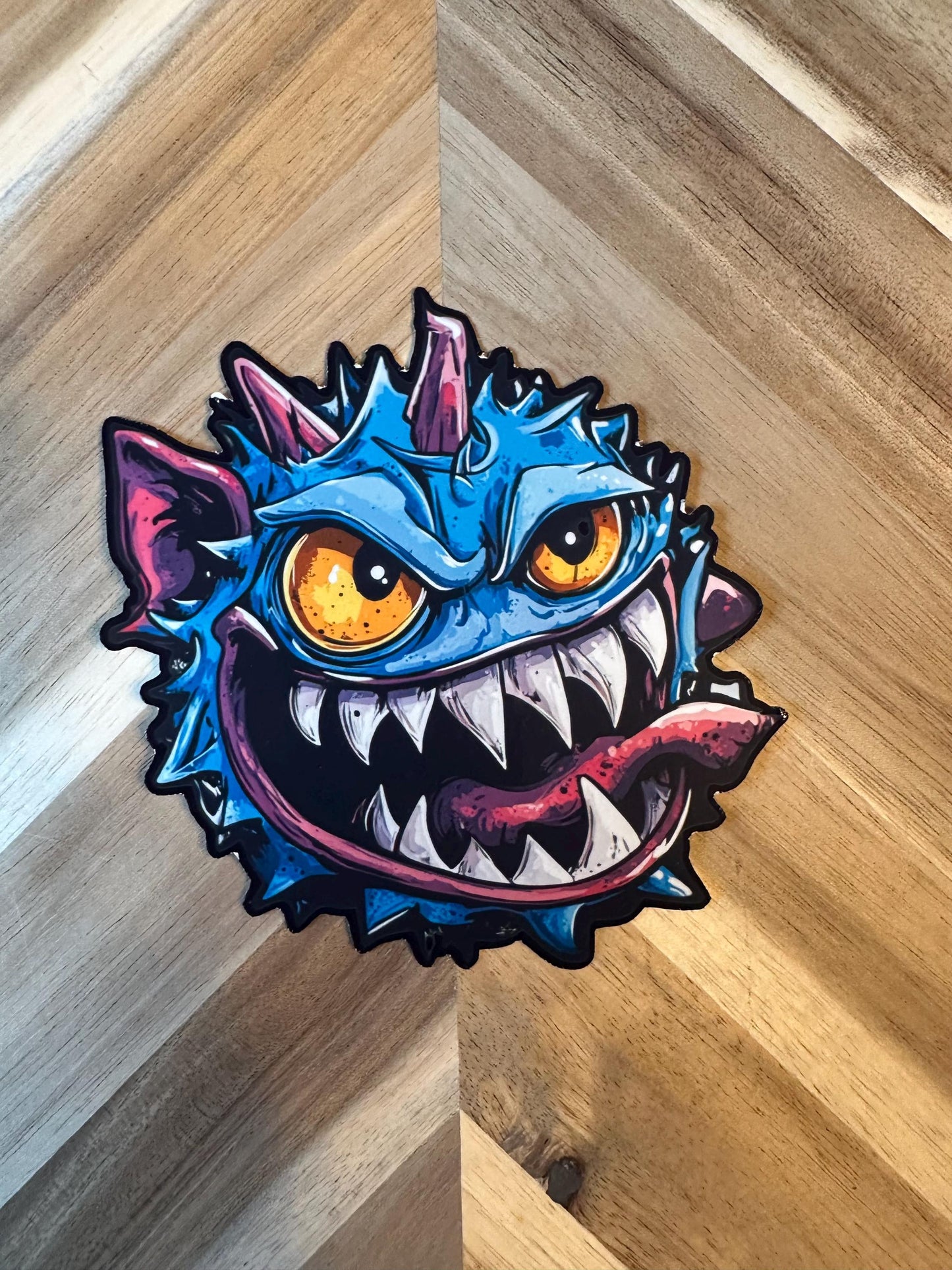 Blue Spike Monster Vinyl Sticker: Mischievous Gaming Character Art