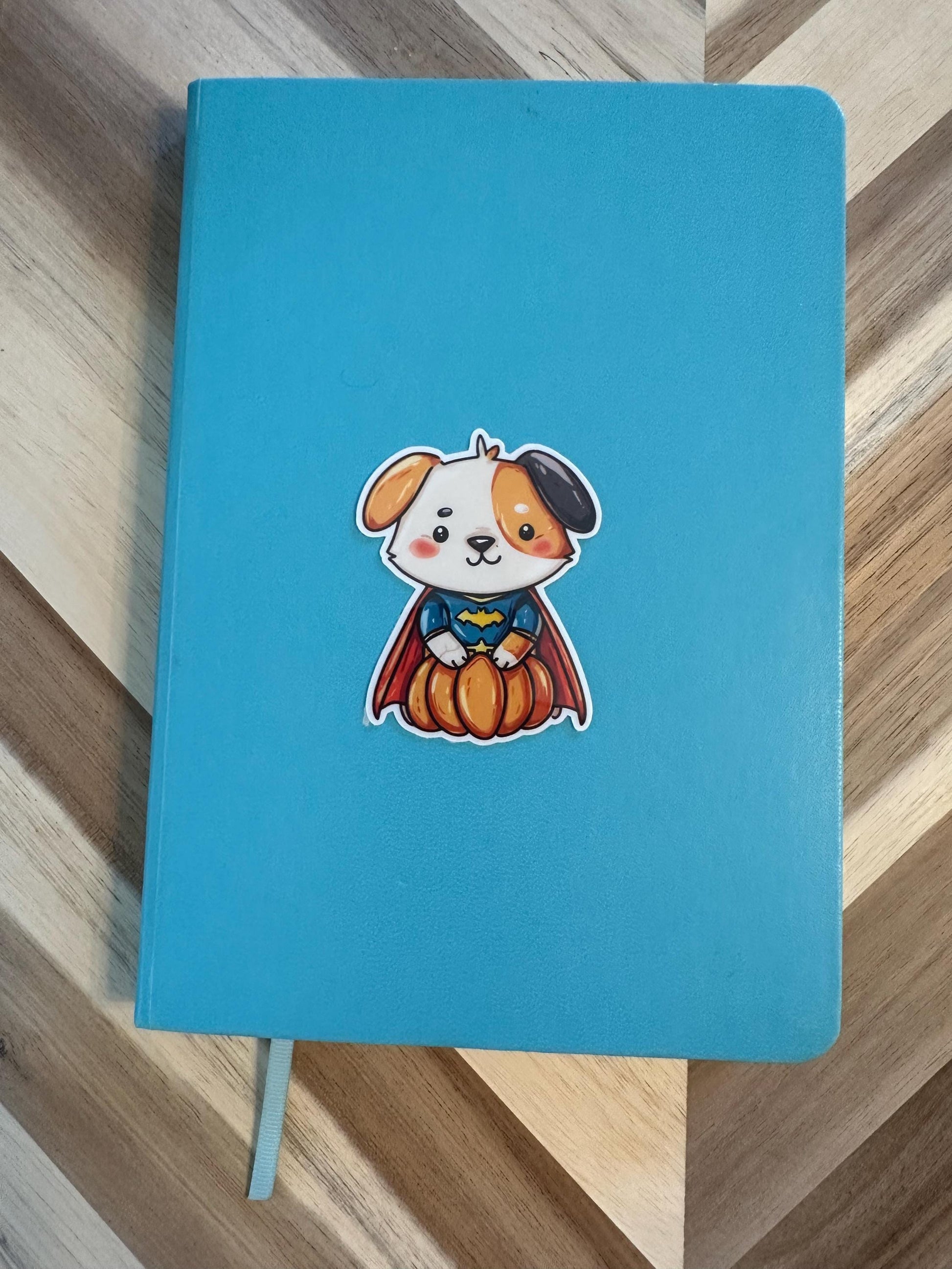 Cute Halloween Superhero Dog Sticker - Puppy in Pumpkin with Cape Vinyl Sticker